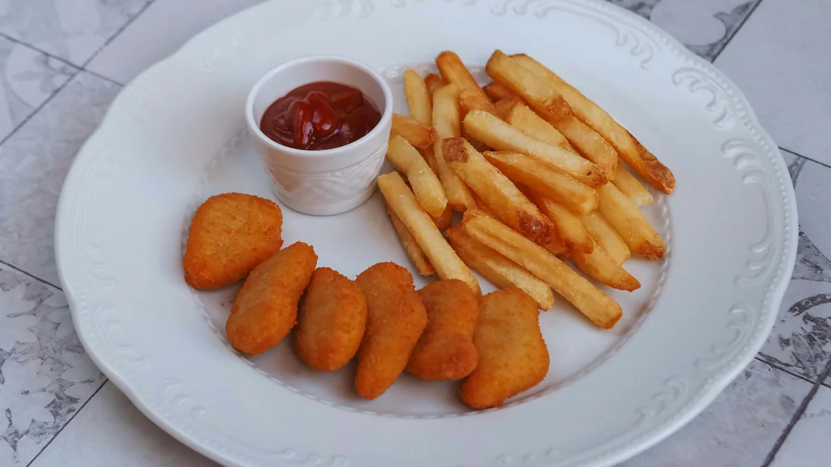 Crispy chicken bites with fries — recreate the Dave's Hot Chicken Fallout Saucy Bites kit