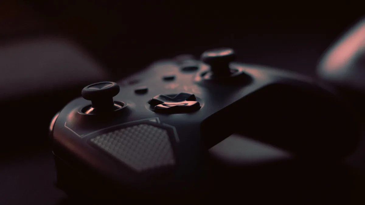 A game controller in low light — the Dave's Hot Chicken and Fallout video game collaboration