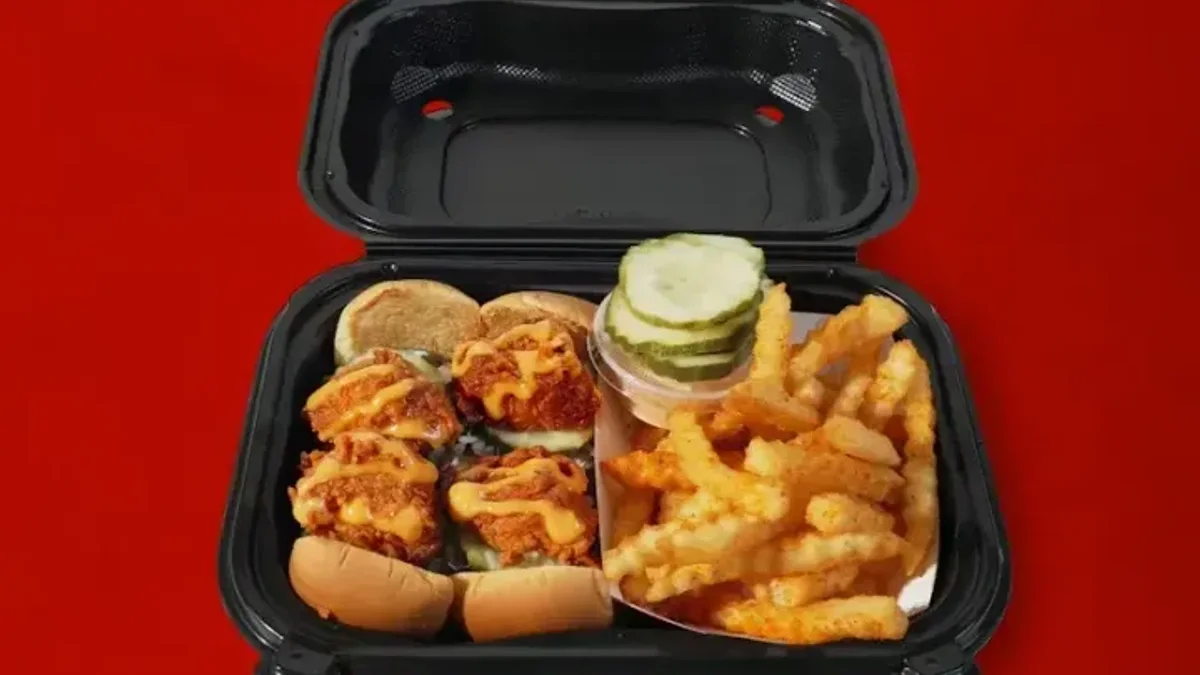 Dave's Hot Chicken sliders and fries — a signature franchise menu item
