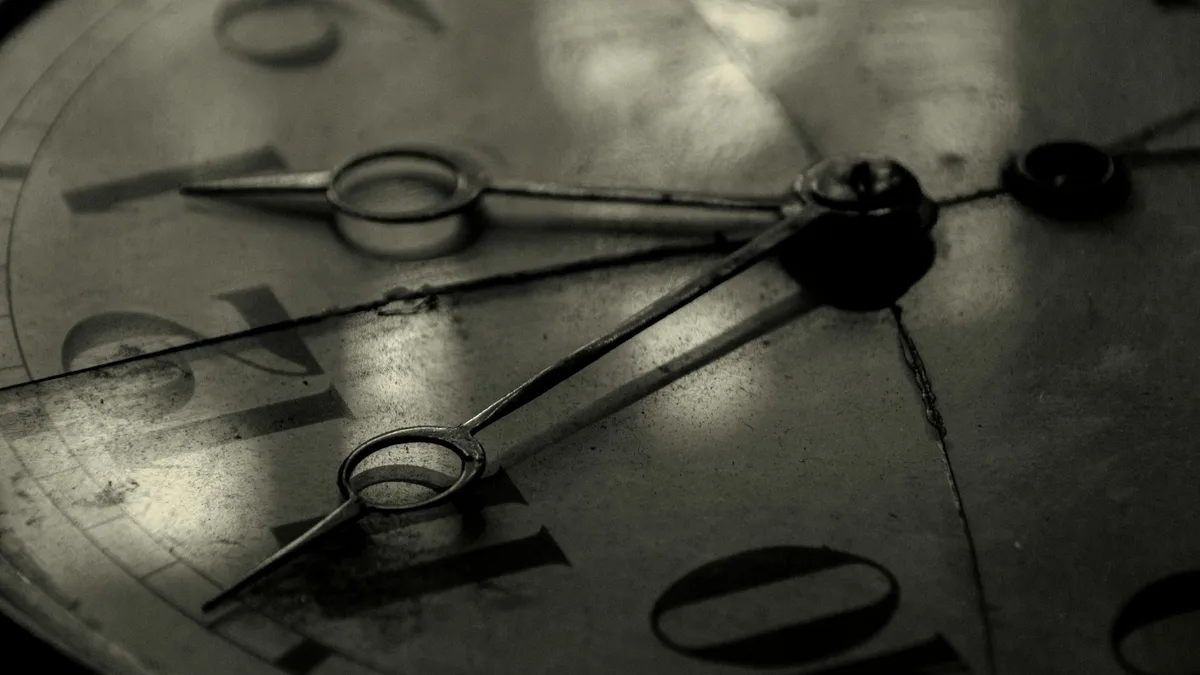 Close-up of a vintage clock face — typical Dave's Hot Chicken opening and closing times