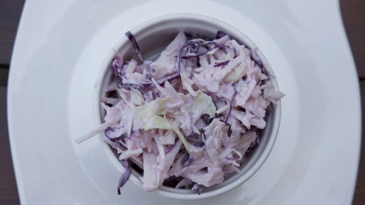Fresh shredded kale and cabbage for slaw — the base of Dave's Hot Chicken kale slaw