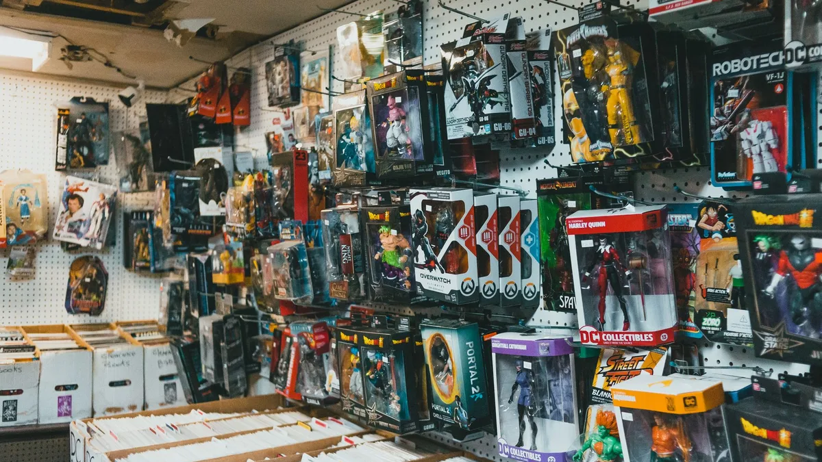 A shelf of collectible superhero and robot figures — the Dave's X-Meal X-Men '97 blind-bag toys