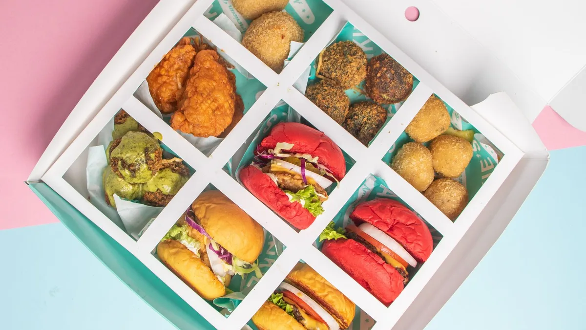 A box of sliders and fries — the food in the Dave's Hot Chicken X-Meal