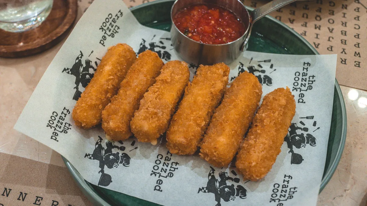Golden fried mozzarella planks with marinara — Dave's Hot Mozz calories per piece